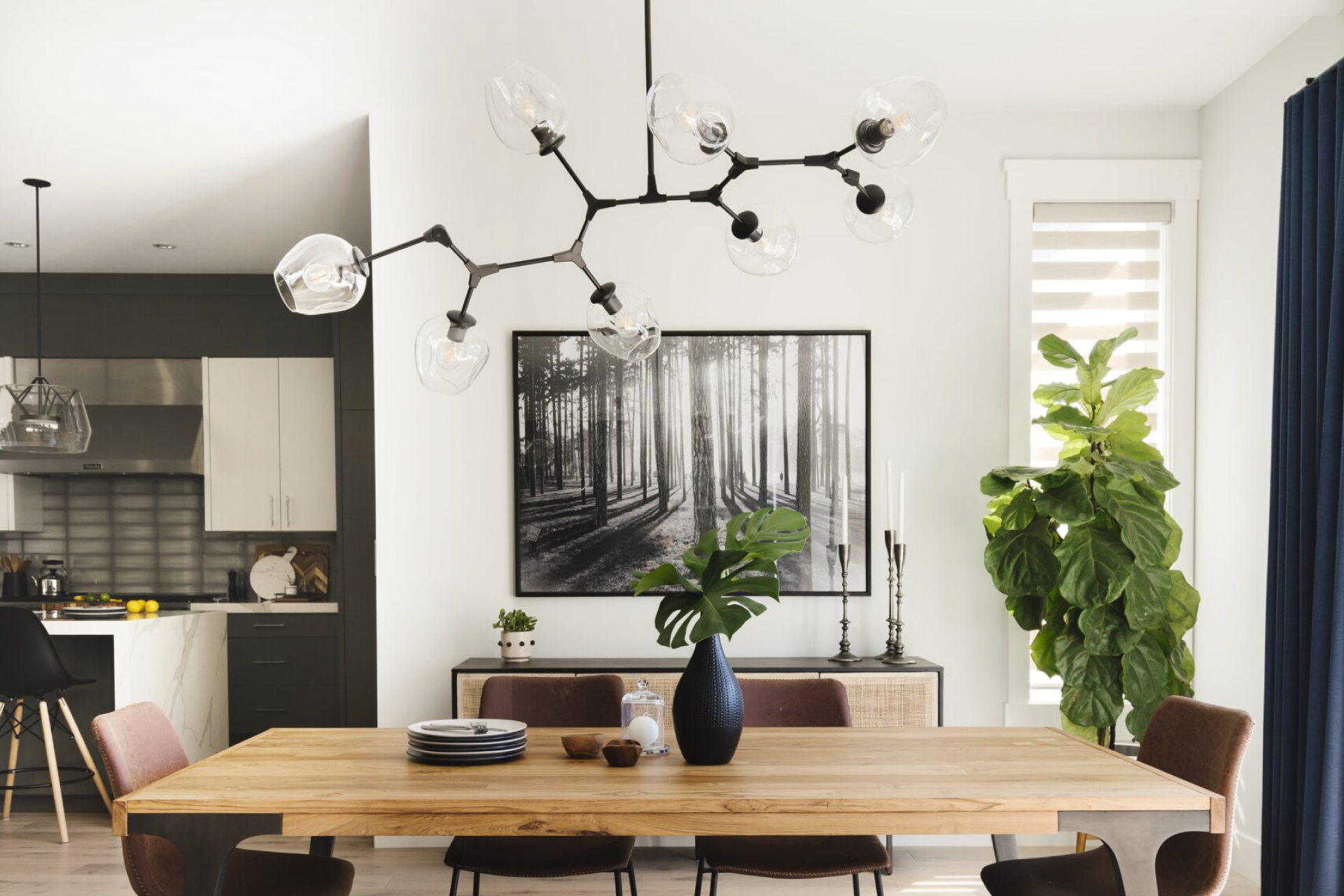 A modern hoe with black and white accents and a unique light fixture.