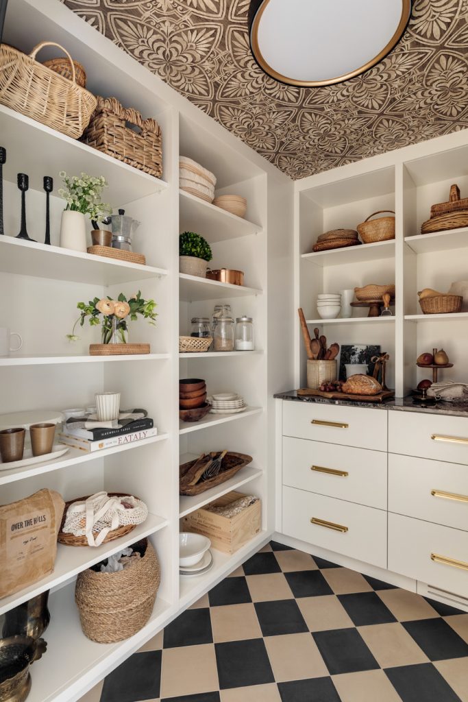A newly remodelled kitchen pantry with custom shelving.