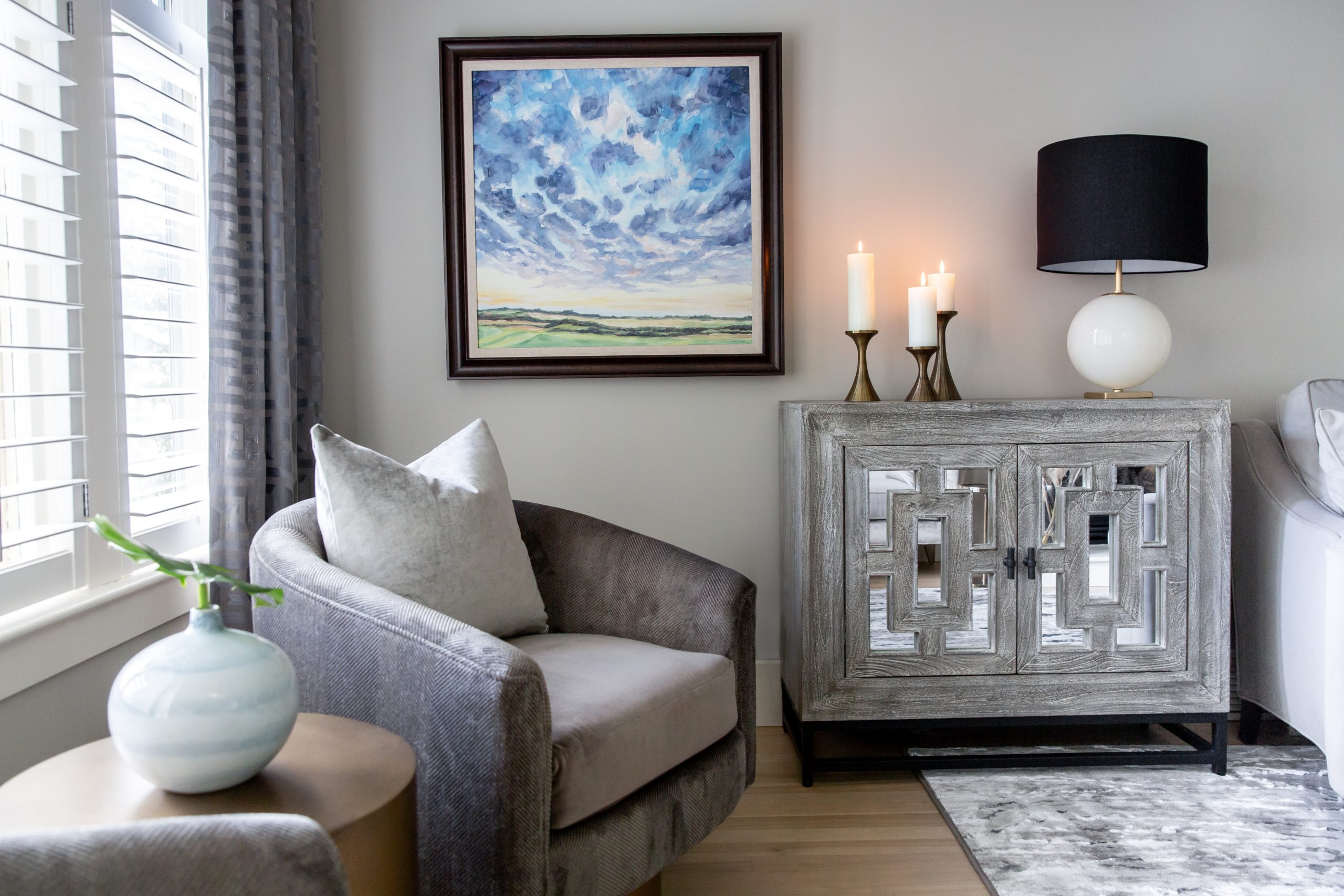 A small living room designed around a piece of art.