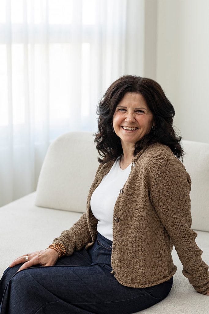 Professional headshot of a female owner of a Calgary home renovation construction company.